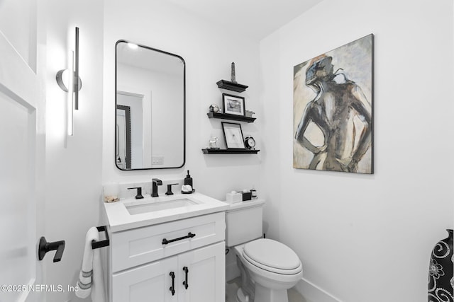 33 Loggerhead Ln, Ponte Vedra Beach, FL 32082 - bathroom featuring toilet, vanity, and baseboards