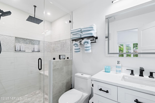 33 Loggerhead Ln, Ponte Vedra Beach, FL 32082 - bathroom with a stall shower, vanity, and toilet