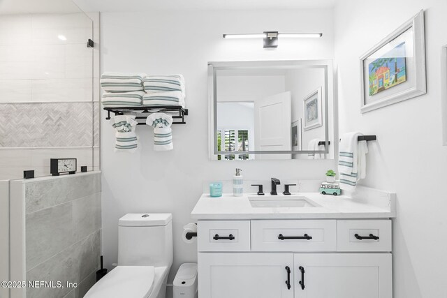 33 Loggerhead Ln, Ponte Vedra Beach, FL 32082 - full bath with a tile shower, toilet, and vanity