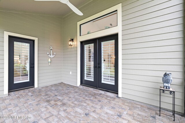 33 Loggerhead Ln, Ponte Vedra Beach, FL 32082 - view of exterior entry featuring french doors, ceiling fan, and a patio
