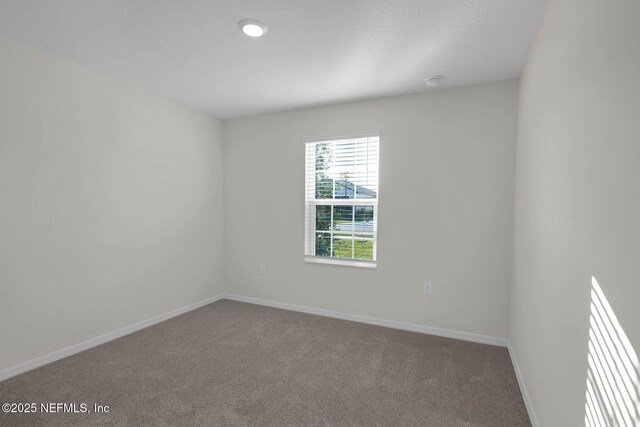 37135 Whippoorwill Ct, Hilliard, FL 32046 - unfurnished room featuring carpet flooring and baseboards