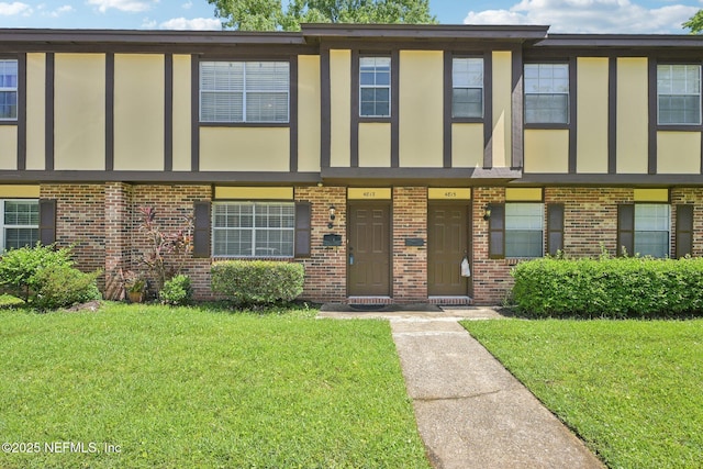 4813 Cherwell Ln Unit B-4-C, Jacksonville, FL 32217 - multi unit property featuring brick siding and a front yard