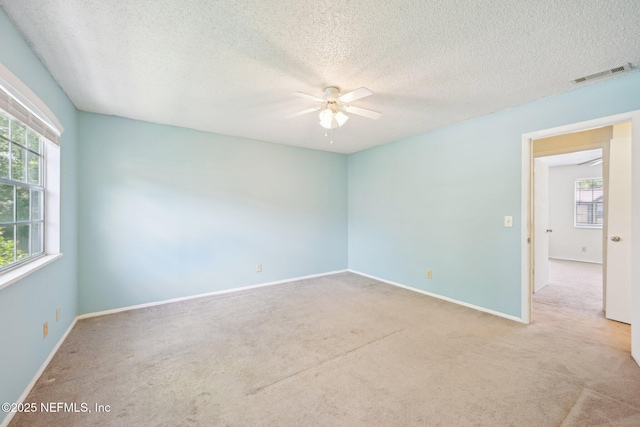 4813 Cherwell Ln Unit B-4-C, Jacksonville, FL 32217 - carpeted empty room featuring ceiling fan, a textured ceiling, and baseboards