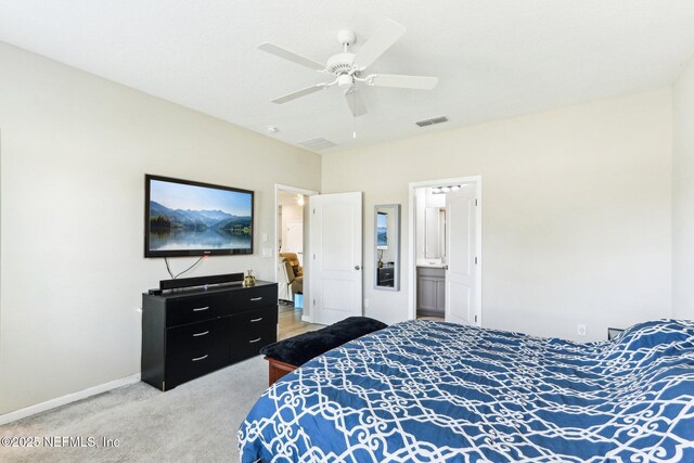 bedroom with light carpet, baseboards, and ceiling fan