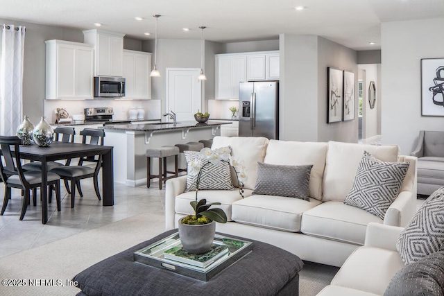 living area featuring recessed lighting