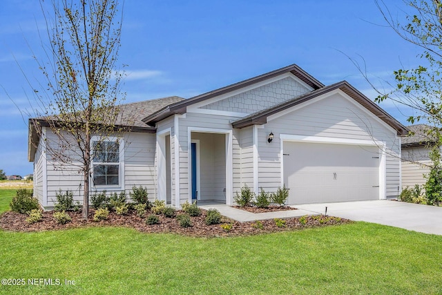 37143 Whippoorwill Ct, Hilliard, FL 32046 - view of front of house featuring a garage, driveway, and a front lawn