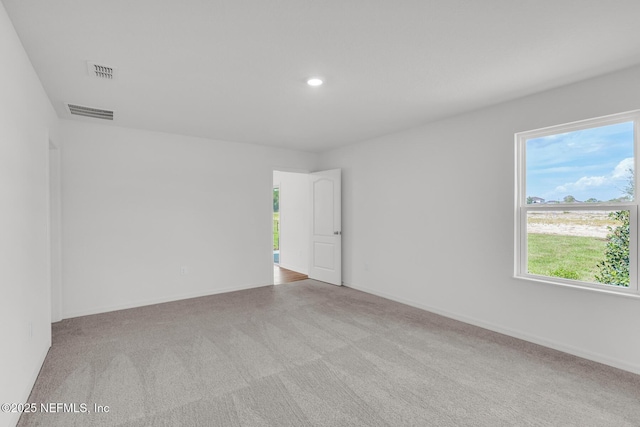 37143 Whippoorwill Ct, Hilliard, FL 32046 - spare room featuring carpet floors, recessed lighting, and baseboards
