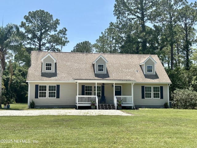 1305 Thompson Bailey Rd, Saint Augustine, FL 32084 - cape cod-style house with covered porch, a front lawn, crawl space, and roof with shingles