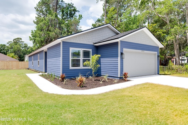959 Florida St, Fleming Island, FL 32003 - view of side of home with a garage and driveway