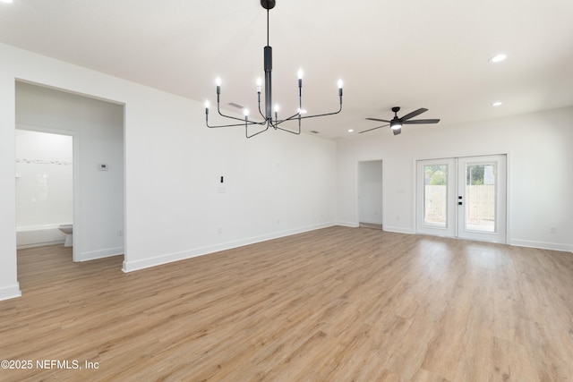 959 Florida St, Fleming Island, FL 32003 - unfurnished dining area featuring a chandelier, recessed lighting, light wood finished floors, baseboards, and a ceiling fan