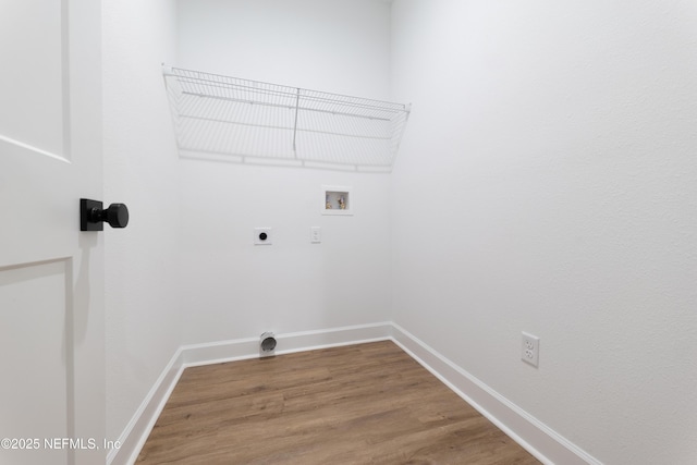 959 Florida St, Fleming Island, FL 32003 - laundry room featuring hookup for an electric dryer, hookup for a washing machine, wood finished floors, and baseboards