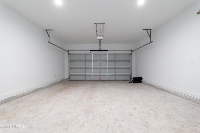 959 Florida St, Fleming Island, FL 32003 - garage featuring baseboards and a garage door opener