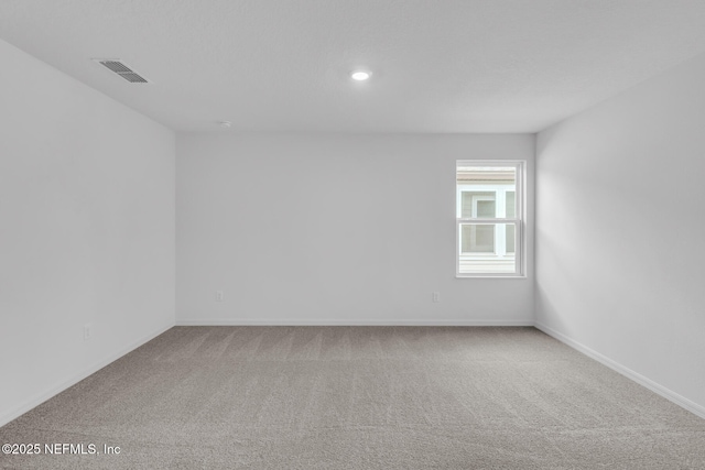37322 Whisper Way, Hilliard, FL 32046 - carpeted empty room with baseboards and recessed lighting