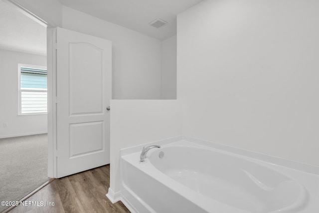 37322 Whisper Way, Hilliard, FL 32046 - full bath with a bath and wood finished floors