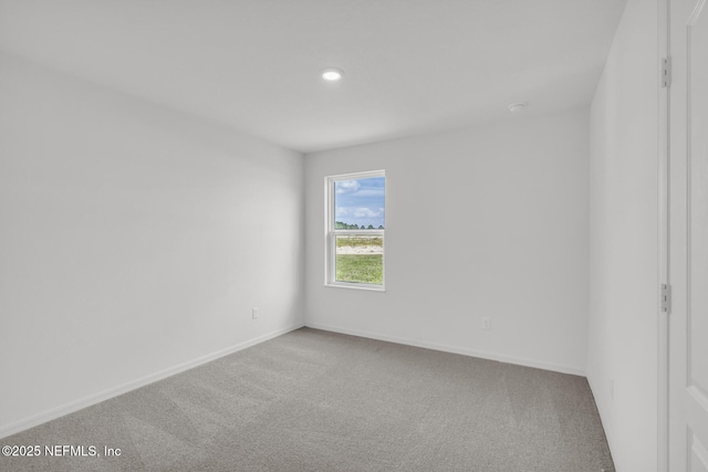 37322 Whisper Way, Hilliard, FL 32046 - carpeted spare room featuring baseboards and recessed lighting