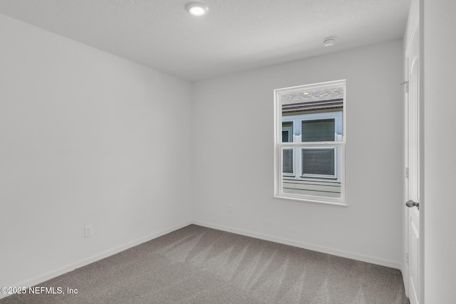 37322 Whisper Way, Hilliard, FL 32046 - carpeted empty room with baseboards