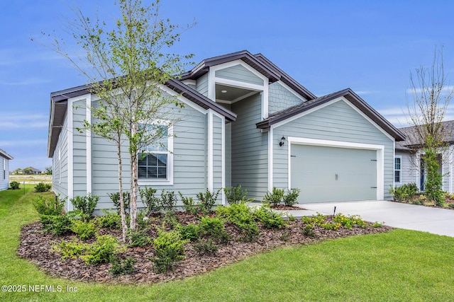 37127 Whippoorwill Ct, Hilliard, FL 32046 - view of front of house with driveway, an attached garage, and a front yard