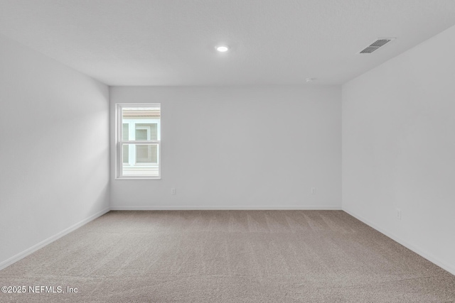 37127 Whippoorwill Ct, Hilliard, FL 32046 - carpeted empty room featuring baseboards and recessed lighting