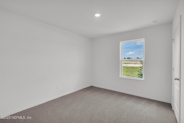 37127 Whippoorwill Ct, Hilliard, FL 32046 - carpeted empty room featuring baseboards and recessed lighting