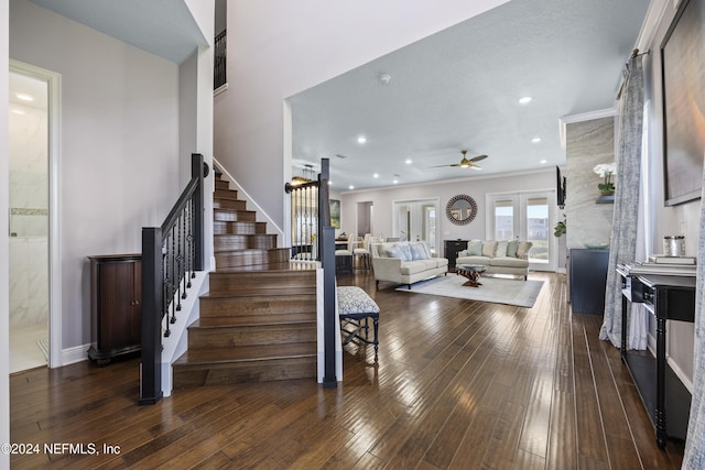 228 Rum Runner Way, Saint Johns, FL 32259 - living room featuring stairs, ceiling fan, dark wood-style floors, recessed lighting, and ornamental molding