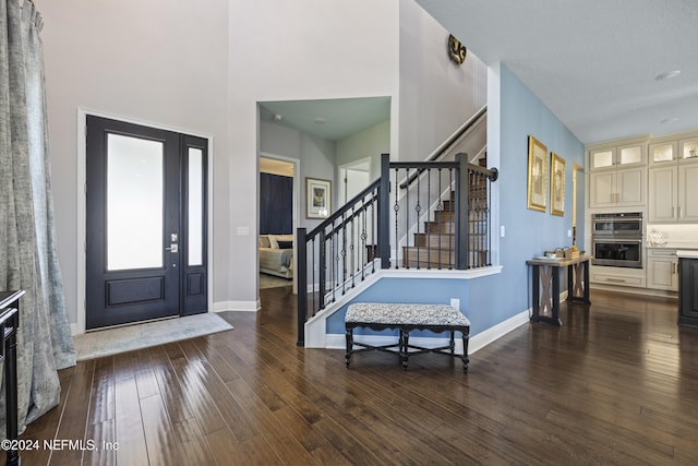 228 Rum Runner Way, Saint Johns, FL 32259 - foyer with stairway, wood-type flooring, baseboards, and a high ceiling