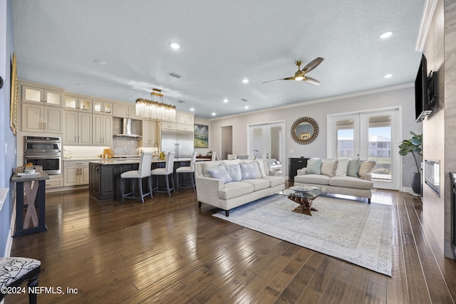 228 Rum Runner Way, Saint Johns, FL 32259 - living area featuring crown molding, dark wood-style floors, ceiling fan, and recessed lighting