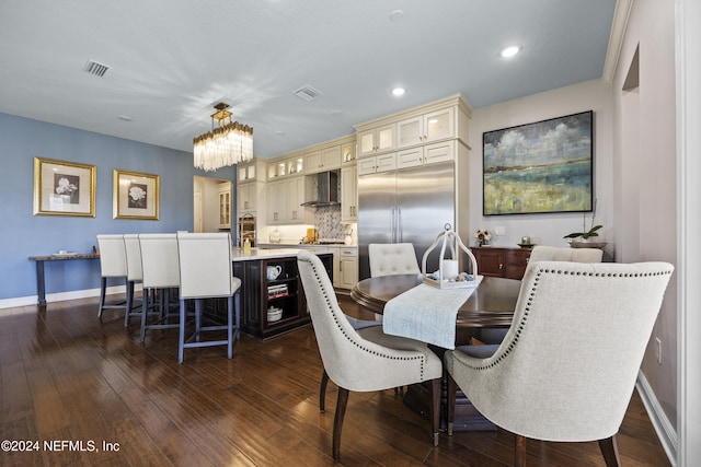 228 Rum Runner Way, Saint Johns, FL 32259 - dining room with baseboards, dark wood-style floors, recessed lighting, and a chandelier