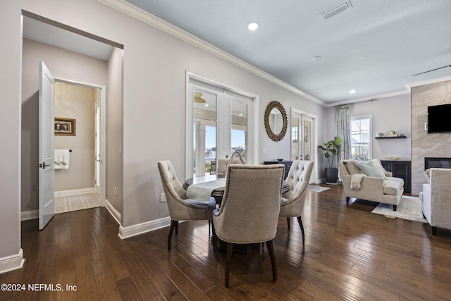 228 Rum Runner Way, Saint Johns, FL 32259 - dining area featuring ornamental molding, a high end fireplace, baseboards, dark wood-style flooring, and recessed lighting