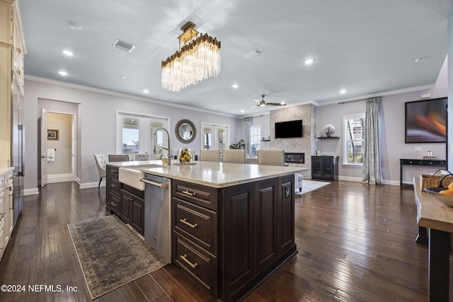 228 Rum Runner Way, Saint Johns, FL 32259 - kitchen featuring dishwasher, light countertops, a sink, a ceiling fan, and ornamental molding