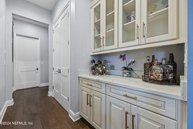 228 Rum Runner Way, Saint Johns, FL 32259 - bar area featuring dark wood finished floors and baseboards