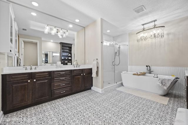 228 Rum Runner Way, Saint Johns, FL 32259 - full bath featuring a stall shower, a freestanding bath, double vanity, recessed lighting, and baseboards