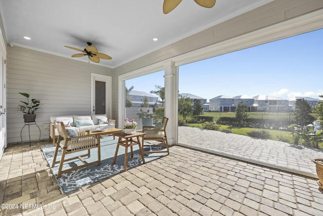 228 Rum Runner Way, Saint Johns, FL 32259 - sunroom / solarium with a ceiling fan and a residential view