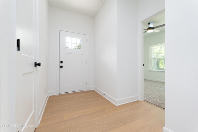 965 Florida St, Fleming Island, FL 32003 - foyer with light wood-style floors, plenty of natural light, baseboards, and a ceiling fan