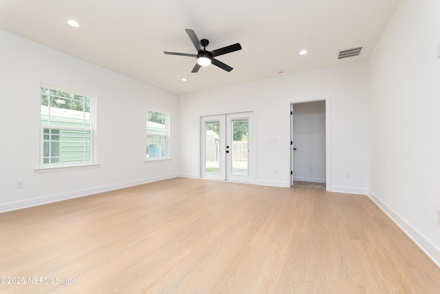 965 Florida St, Fleming Island, FL 32003 - unfurnished room featuring ceiling fan, light wood-type flooring, recessed lighting, baseboards, and french doors