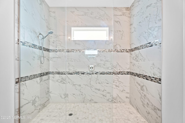 full bathroom featuring a shower stall