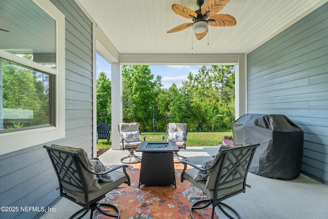 view of patio with a grill, a fire pit, and ceiling fan