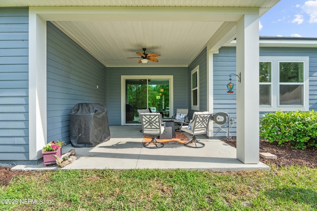view of patio / terrace with ceiling fan and grilling area
