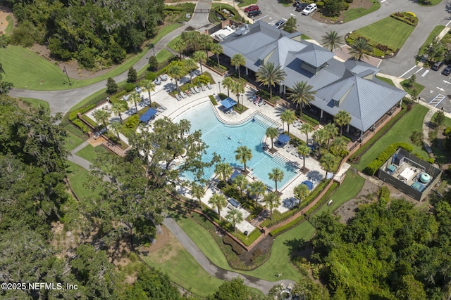 view of property location with a pool area