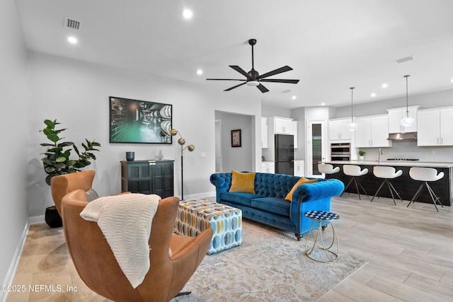 241 Oak Shadow Pl, Saint Johns, FL 32259 - living area with recessed lighting and a ceiling fan