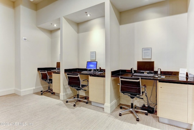 home office featuring carpet floors and baseboards