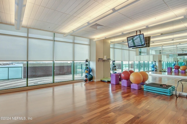 workout room with wood finished floors