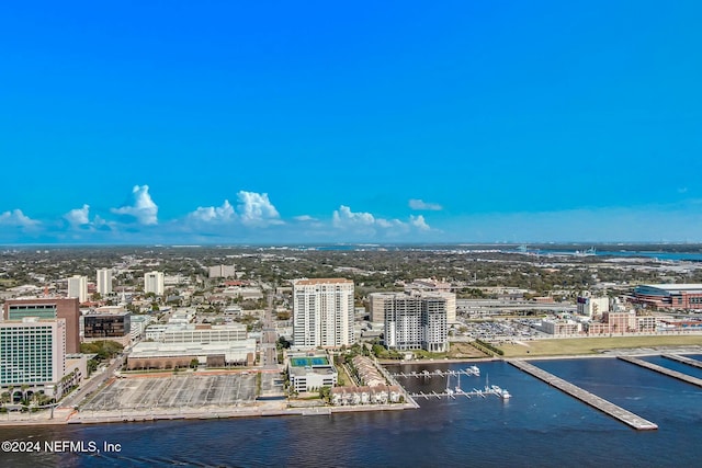 view of urban area featuring a nearby body of water