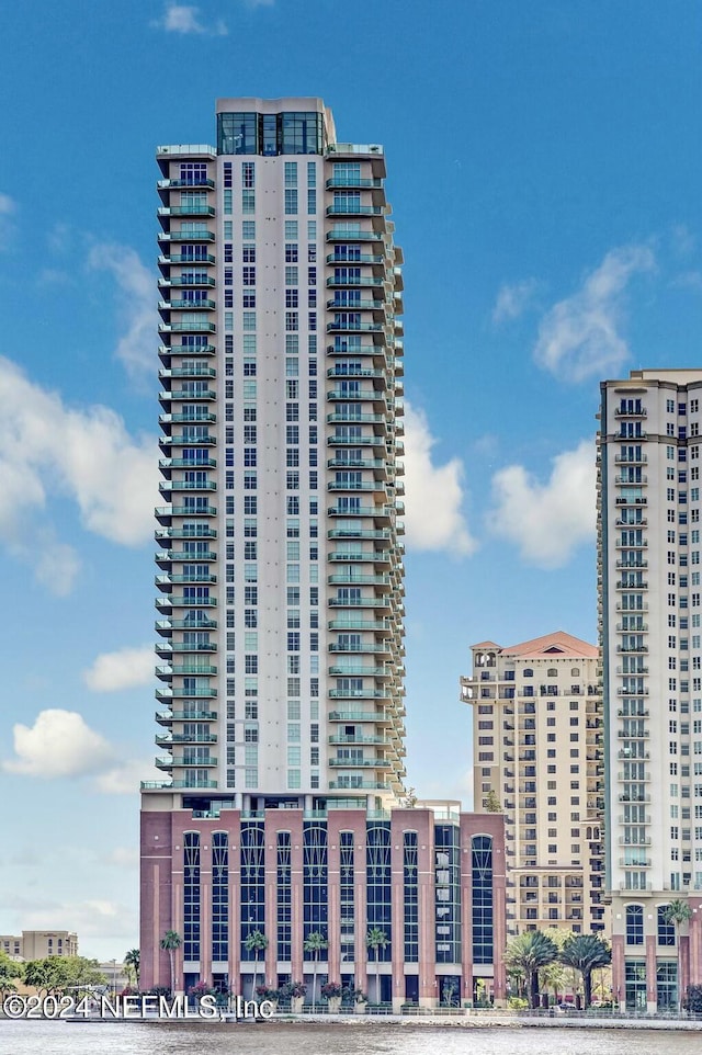 view of building exterior featuring a view of city