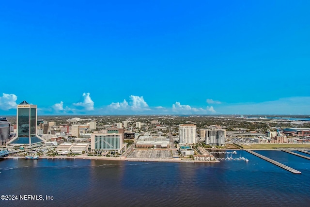 view of urban area with a large body of water