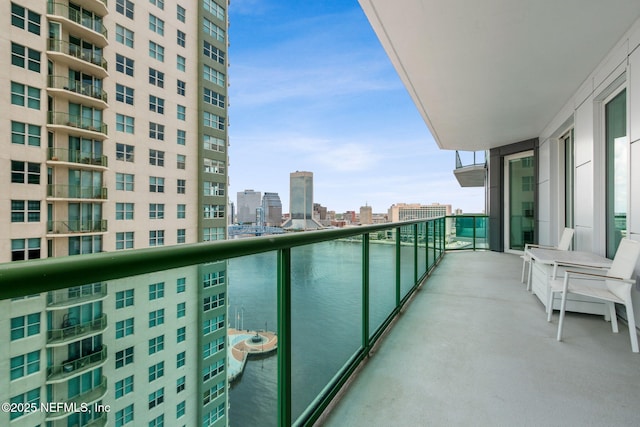 balcony featuring a view of city
