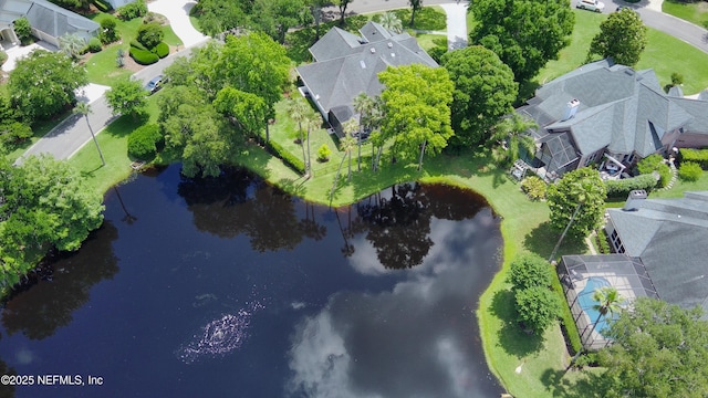 aerial view of residential area with a nearby body of water