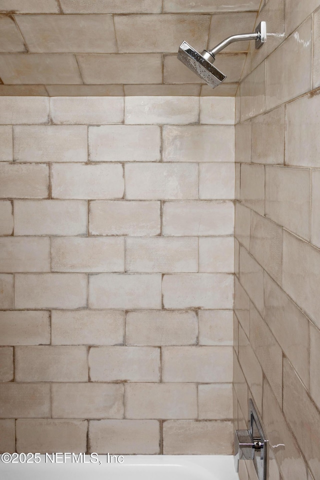 full bath with bathing tub / shower combination