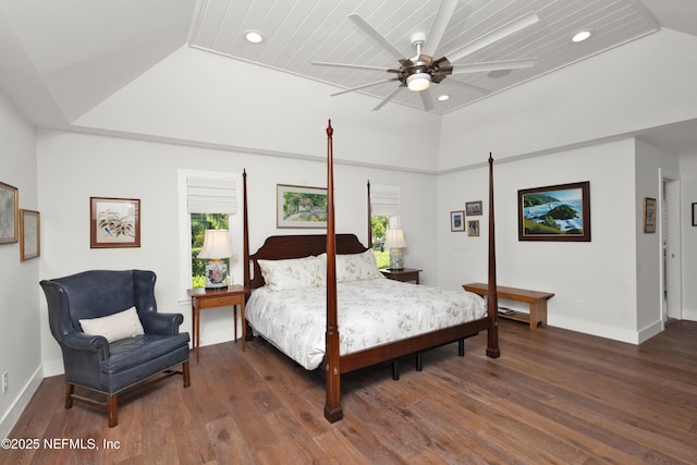 bedroom with recessed lighting, wood finished floors, and baseboards