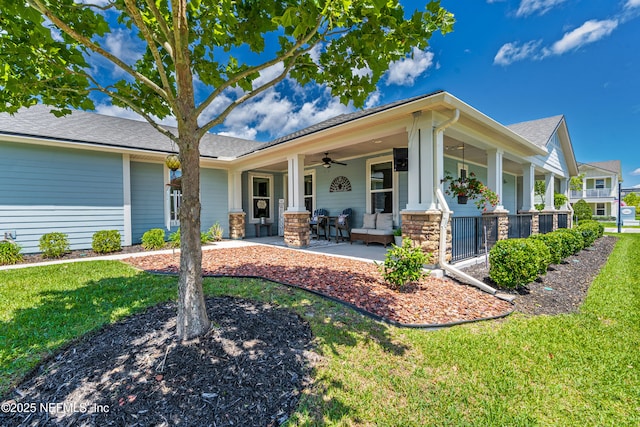 929 Keystone Corners Blvd, Saint Johns, FL 32259 - view of front of house featuring ceiling fan, a porch, a front lawn, and roof with shingles