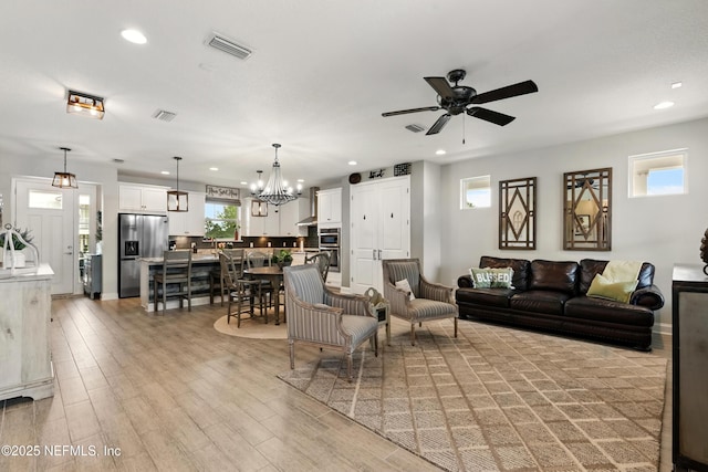 929 Keystone Corners Blvd, Saint Johns, FL 32259 - living area featuring recessed lighting, a ceiling fan, a chandelier, and light wood finished floors